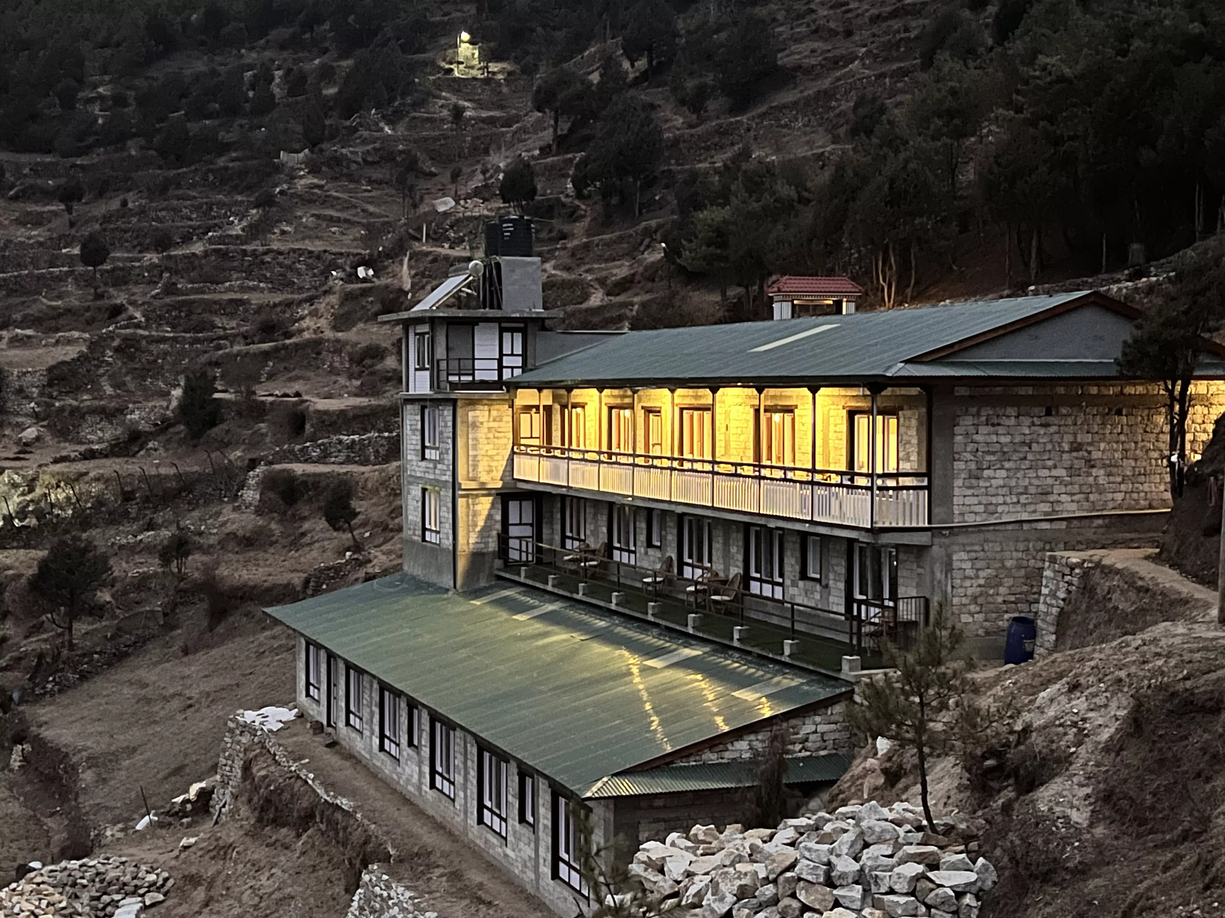 View of the Himalayas from a guest room window at Namche Terrace