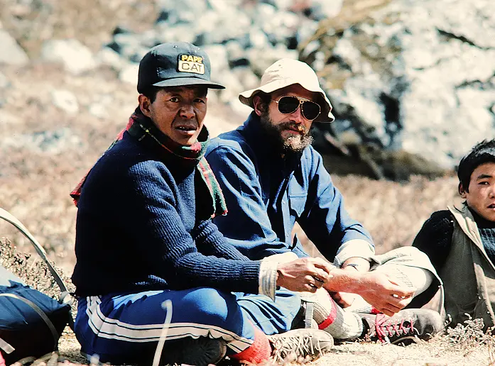 Snow-capped Himalayan peaks above a high-altitude valley
